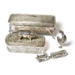 A silver topped cut glass box with novelty silver pin cushion top modelled as a pig, marks partially