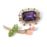 A 9 carat gold amethyst brooch and a coral and nephrite flower brooch (2)