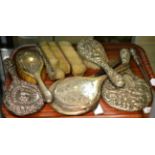 Quantity of assorted silver backed dressing table brushes and mirrors