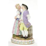 A Meissen Porcelain Figure Group, circa 1900, as an 18th century boy and girl dancing arm-in-arm