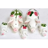 ~ A Plichta Pottery Pepper Pot, in the form of a pig, painted with thistles, 11.5cm long; and Four