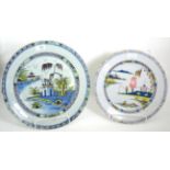 An English Delft Charger, circa 1750, painted in colours with a chinoiserie scene depicting a