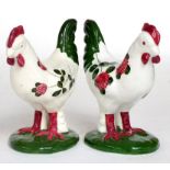 ~ A Pair of Plichta Pottery Models of Hens, 20th century, painted with flowers, printed marks, 15.