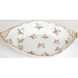 ~ A Porcelain Fluted Oval Dish, possibly Swansea, circa 1820, painted with pink rose sprigs, 35cm