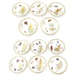 A Set of Eleven Royal Worcester Porcelain Dessert Plates, circa 1880, painted and gilt with