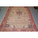 Sultanabad Carpet West Iran The cream field with a central medallion surrounded by stylised plants