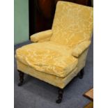 A Victorian Walnut Framed Armchair, circa 1870, recovered with yellow floral cut velvet, with padded