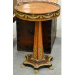 A Louis XVI/Transitional Style Amboyna, Kingwood and Gilt Metal Mounted Pedestal Table, the circular