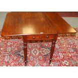 ~ A Victorian Mahogany Pembroke Table, mid 19th century, with two rounded drop leaves above one real