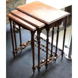 A Set of Three Late 19th Century Walnut Nesting Tables, of rectangular graduated form, each