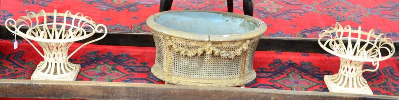 ~ A Carved Pine, Parcel Gilt and Cane Sided Oval Planter, with removable metal liner, the body