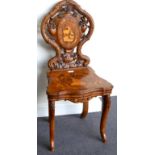 A Continental Walnut and Marquetry Inlaid Musical Chair, probably Swiss or Austrian, circa 1900, the