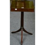 A George III Yewwood and Crossbanded Work Table, early 19th century, the hinged lid enclosing fitted