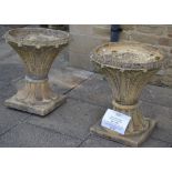 A Pair of Composition Pedestal Garden Urns, of circular tapering form decorated with acanthus