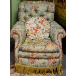 A Victorian Easy Chair, circa 1870, recovered in turquoise and gold floral print with buttoned back,