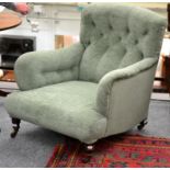 ^ A Victorian Howard Style Armchair, late 19th century, recovered in green button back velvet,