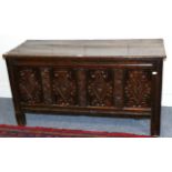 A Joined Oak Chest, late 17th/early 18th century, with boarded hinged lid enclosing a blue painted