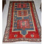 Kazak Rug Central Caucasus, circa 1910 The madder field with double niche panel enclosed by mint