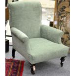 ^ A Victorian Armchair, late 19th century, recovered in green velvet, with overstuffed seat,