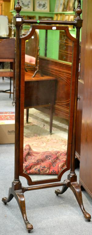 ^ A 19th Century Mahogany and Barber's Pole Strung Cheval Mirror, with shaped rectangular plate