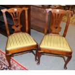 A Pair of George II Provincial Walnut Dining Chairs, mid 19th century, with pierced splat and yellow