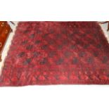 Good Turkmen Carpet North Afghanistan, 20th century The deep claret field with three columns of