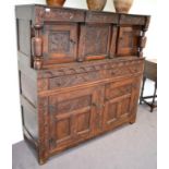 A 17th Century and Later Oak Court Cupboard, of typical form, plank-top, two cupboards above two