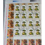 Two Boxes Containing World Stamps in albums. A box of FDCs and a 1987 Royal Mail year set