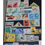A Carton housing worldwide in albums, stockbooks, unopened 1960s and 1970s stamp packets, stamps