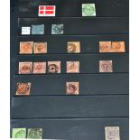 Denmark. A 1854 to 2009 mint and used collection in three blue binders. Includes booklets and