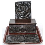 Two small carved oak panels and a carved oak box