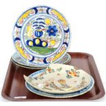 A collection of 18th century Delftware plates, polychrome, blue and white, some damage (5)