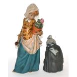 Two Lladro figuresGirl carrying a flower pot is restored, 33cm high. Other figure is in good