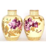 A pair of Royal Crown Derby gilt and floral painted vases Height 22cm. Some rubbing to the gilded