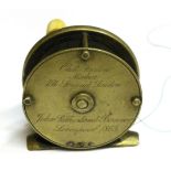 A Chas Farlow 2 1/2inch Brass Fly Reel, with ivorine handle, brass foot, inscribed to back 'Chas