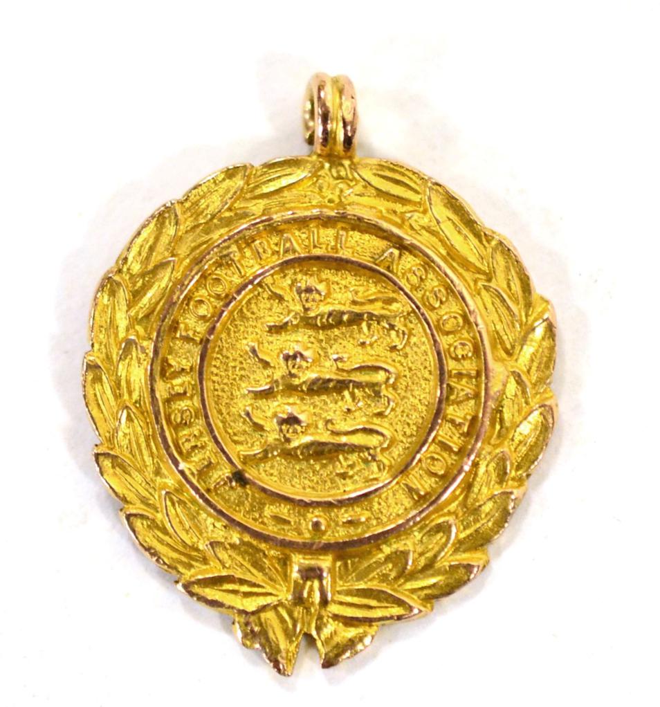 Jersey Football Association Medal, 9ct gold, one side worked with three lions enclosed by a laurel