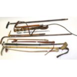 Various Crops And Whips including crop with brass fox head handle, whip with measuring stick inside,