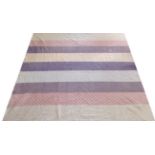 Late 19th Century Reversible Striped Quilt, primarily incorporating pink, purple and blue printed