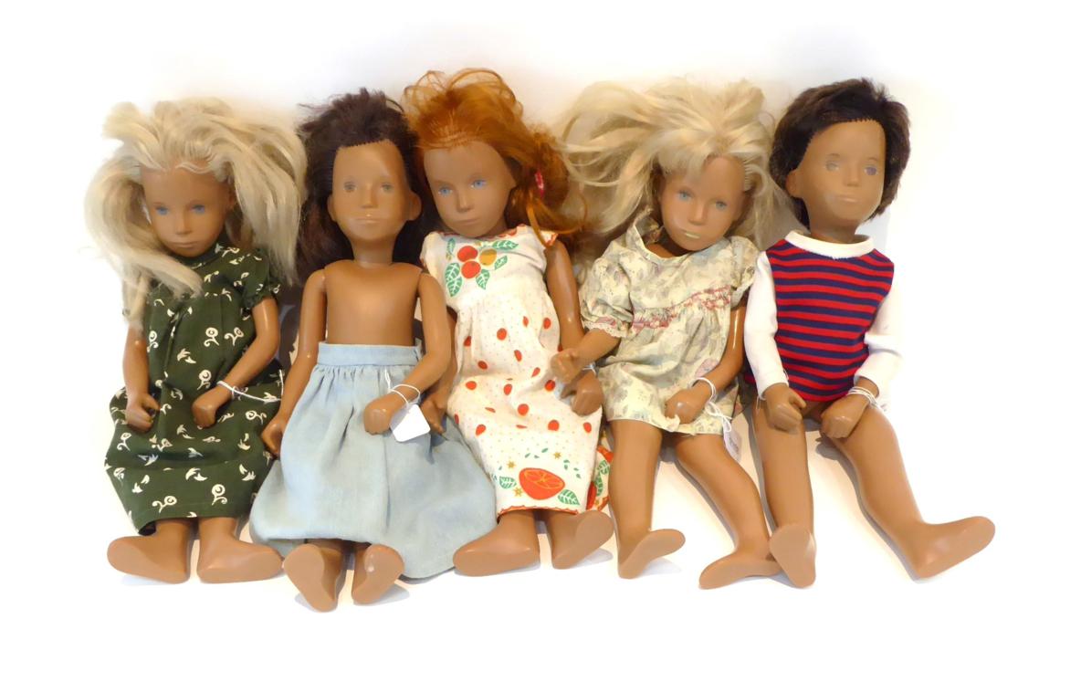 Five Assorted Sasha Dolls, partly clothed, one of the Sasha Doll in a cylindrical box and c
