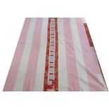 Late 19th Century Patchwork Cover, with coloured stripes to one side in pinks and reds, with a