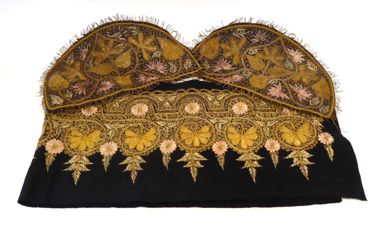 A Late 19th Century Black Wool Pelmet, profusely and densely embroidered in mainly gold threads,