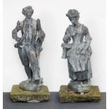 A Pair of French Lead Figures of Gardeners, 19th century, in the manner of John Cheere, both in 18th
