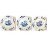 A Set of Three English Delft Chargers, circa 1740, painted in blue with peony and bamboo amongst