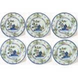 A Set of Six English Delft Plates, probably London, circa 1740, painted in colours with flowers