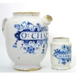 An English Delft Wet Drug Jar, circa 1730, of ovoid form with cylindrical spout and strap handle,