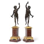 A Pair of Bronze Figures of Bacchic Maidens, in Empire style, each running wearing loose robes,