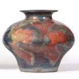 Sutton Taylor (Yorkshire, b.1943): An Earthenware Lustre Vase, wheel thrown, in deep pink, blue