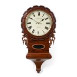 A Mahogany Drop Dial Striking Wall Clock, signed T Milner, Wigan, circa 1850, carved wooden bezel