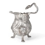 A George II Irish Silver Cream Jug, maker's mark only for John Hamilton, Dublin circa 1730/40,