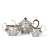 A George IV Silver Three Piece Tea Service, Charles Fox, London 1820, of squat circular form with